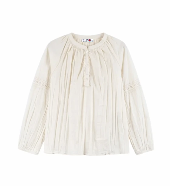 بلوزة نسائية بكسرات